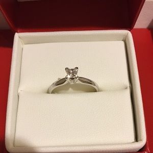 1/4 karat white gold solitaire ring